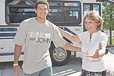 USU First Lady Joyce Albrecht greeting a student